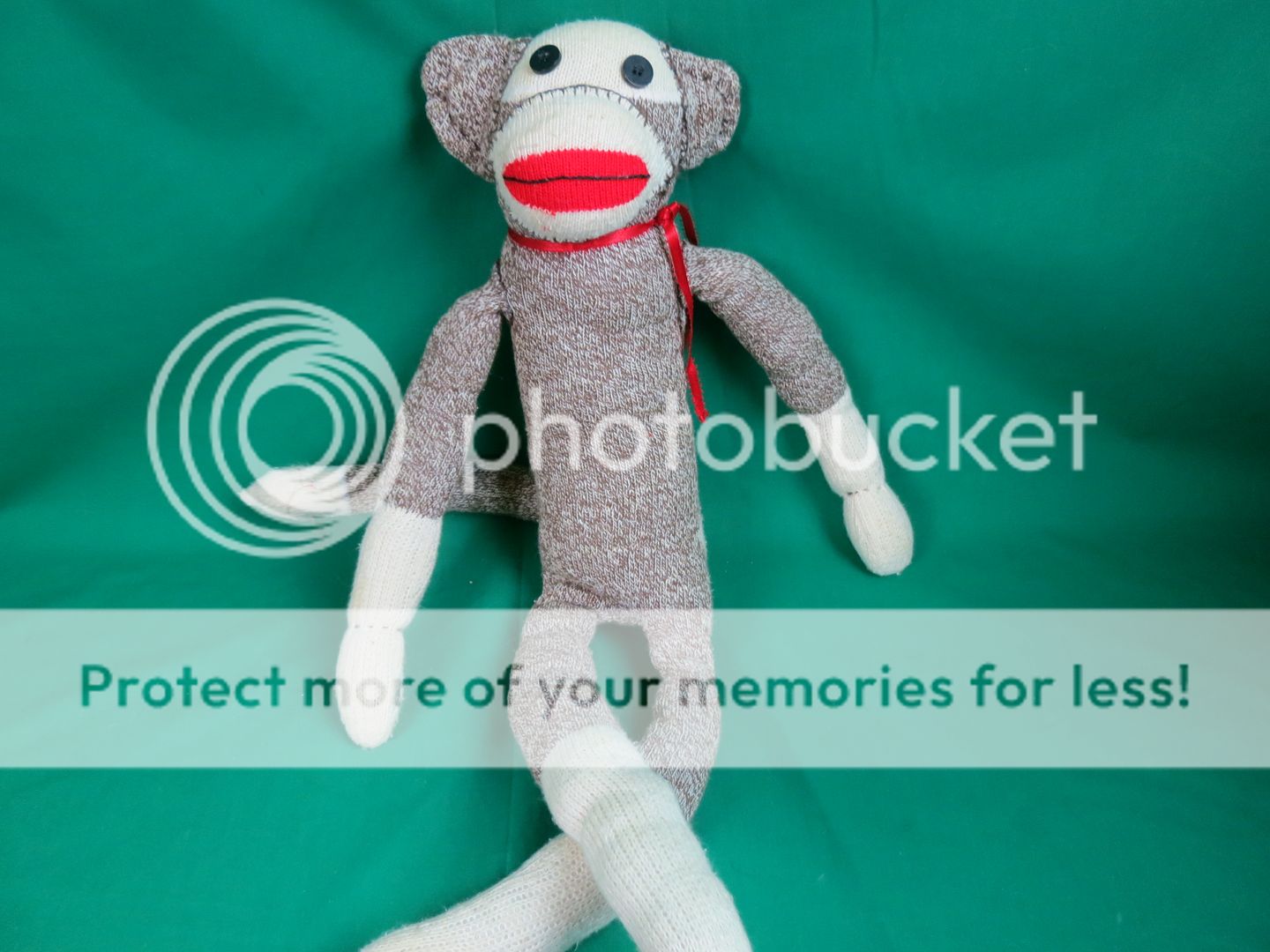 stuffed monkey with red lips